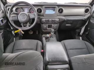 2023 Jeep Wrangler Sport S with VIN 1C4HJXDN5PW678653, listed as a Copart auction lot 57464705 with 22,154 mi miles and Salvage title. Bid and sale history available at DreamBid. Image 8.