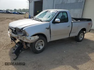1999 Ford F-150 with VIN 1FTZF1829XNB84840, listed as a Copart auction lot 59710765 with 143,767 mi miles and Clean title. Bid and sale history available at DreamBid. Image 1.