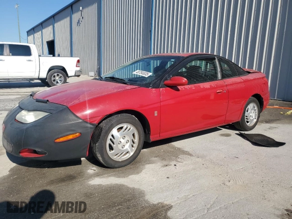 2001 Saturn SC z VIN 1G8ZY12711Z207035, wystawiony jako Copart lot #48784935 z przebiegiem 162 397 mil mil oraz Szkody całkowita. Historia ofert i sprzedaży dostępna na DreamBid. Obrazek 1.