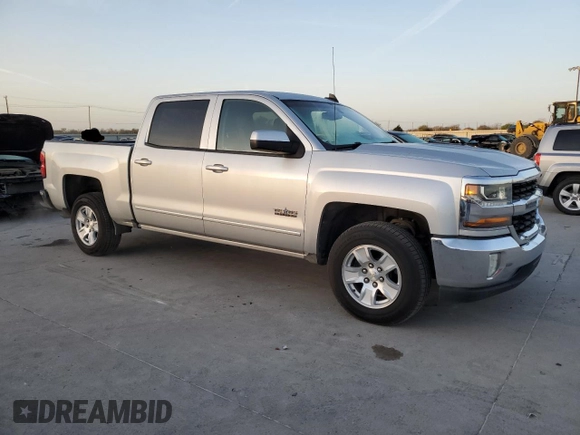 2017 Chevrolet Silverado 1500 LT with VIN 3GCPCREC8HG358032, listed as a Copart auction lot 50010085 with 136,743 mi miles and Clean Title. Bid and sale history available at DreamBid. Image 4.