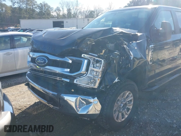 2021 Ford Super Duty F-250 SRW XL with VIN 1FT7W2B61MEE02841, listed as a IAAI auction lot 41454119 with 54,703 mi miles. Bid and sale history available at carsss.com. Image 6.