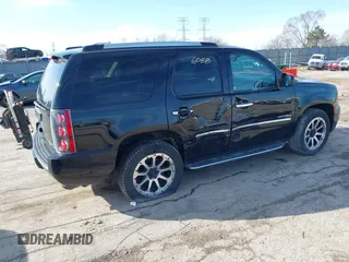 2013 GMC Yukon Denali with VIN 1GKS2EEF7DR347893, listed as a IAAI auction lot 41856088 with 126,213 mi miles. Bid and sale history available at carsss.com. Image 4.