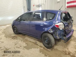 2009 Honda Fit with VIN JHMGE88229S044859, listed as a Copart auction lot 52742495 with 398,726 mi miles and Salvage Title. Bid and sale history available at carsss.com. Image 2.