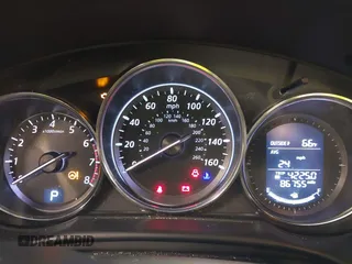 2014 Mazda CX-5 Grand Touring with VIN JM3KE4DY9E0373974, listed as a IAAI auction lot 42073693 with 86,755 mi miles. Bid and sale history available at carsss.com. Image 7.