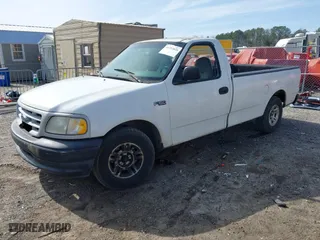 1999 Ford F-150 Work Series with VIN 1FTZF1726XNB58407, listed as a IAAI auction lot 41753826 with 180,172 mi miles. Bid and sale history available at carsss.com. Image 17.