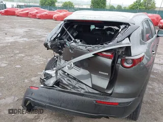2023 Mazda CX-30 S Preferred z VIN 3MVDMBCM5PM576771, wystawiony jako IAAI lot #42244842 z przebiegiem 14 814 mil mil oraz . Historia ofert i sprzedaży dostępna na DreamBid. Obrazek 17.