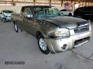 2002 Nissan Frontier XE z VIN 1N6DD26S52C378601, wystawiony jako Copart lot #56782295 z przebiegiem 147 729 mil mil oraz Szkoda całkowita • Salvage title. Historia ofert i sprzedaży dostępna na DreamBid. Obrazek 13.