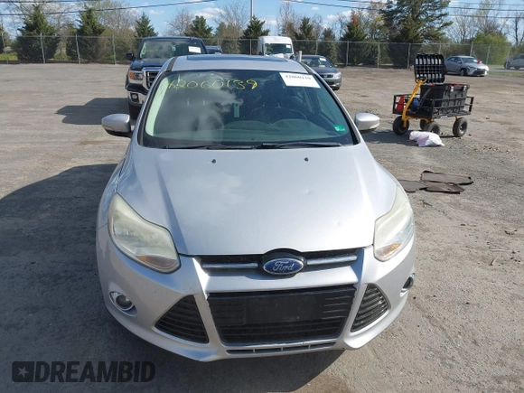 2012 Ford Focus SEL with VIN 1FAHP3H29CL151658, listed as a IAAI auction lot 42060139 with 149,547 mi miles and . Bid and sale history available at carsss.com. Image 12.
