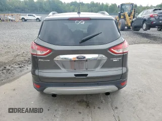 2016 Ford Escape Titanium with VIN 1FMCU9J90GUA01974, listed as a Copart auction lot 60376265 with 177,384 mi miles and Salvage title. Bid and sale history available at DreamBid. Image 6.
