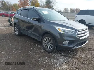 2017 Ford Escape Titanium with VIN 1FMCU9J98HUA49434, listed as a IAAI auction lot 40710866 with 143,850 mi miles. Bid and sale history available at carsss.com. Image 1.