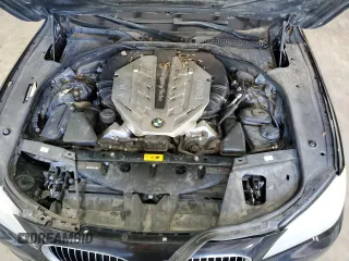 2011 BMW 7 Series with VIN WBAKX6C50BC197118, listed as a Copart auction lot 73686234 with 166,393 mi miles and Clean title. Bid and sale history available at DreamBid. Image 11.