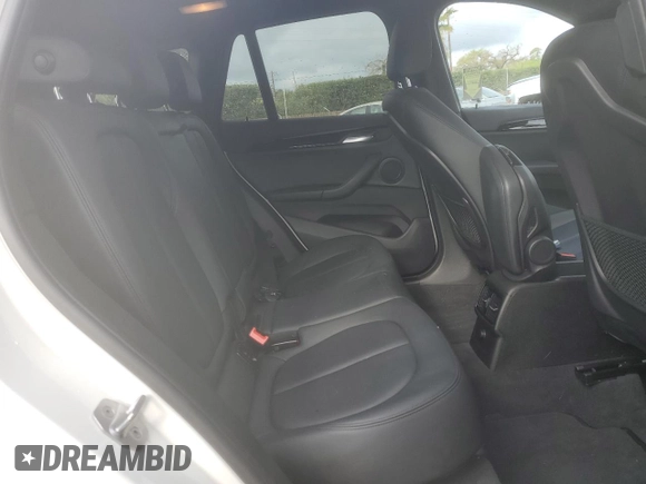 2017 BMW X1 sDrive28i with VIN WBXHU7C32H5H37758, listed as a Copart auction lot 48173225 with 86,488 mi miles and Salvage Title. Bid and sale history available at carsss.com. Image 12.