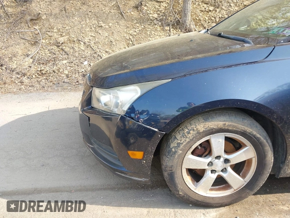 2014 Chevrolet Cruze 1LT with VIN 1G1PC5SB1E7302745, listed as a IAAI auction lot 42142048 with 160,000 mi miles and . Bid and sale history available at DreamBid. Image 12.