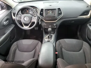 2016 Jeep Cherokee Latitude z VIN 1C4PJLCB9GW303148, wystawiony jako Copart lot #59392805 z przebiegiem 123 015 mil mil oraz Szkoda całkowita • Salvage title. Historia ofert i sprzedaży dostępna na DreamBid. Obrazek 8.