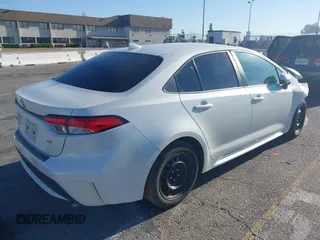2020 Toyota Corolla LE with VIN 5YFEPRAEXLP062290, listed as a IAAI auction lot 41858318 with 80,692 mi miles. Bid and sale history available at carsss.com. Image 4.