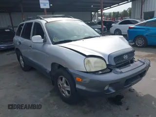 2002 Hyundai Santa Fe GLS z VIN KM8SC13D82U324289, wystawiony jako IAAI lot #41841094 z przebiegiem 217 578 mil mil oraz . Historia ofert i sprzedaży dostępna na DreamBid. Obrazek 1.