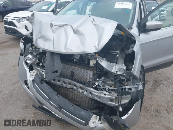 2016 Ford Escape SE with VIN 1FMCU0GX6GUC41452, listed as a IAAI auction lot 39369447 with 235,434 mi miles and . Bid and sale history available at carsss.com. Image 6.