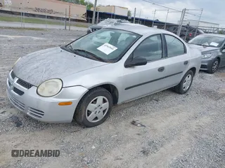 2005 Dodge Neon SE with VIN 1B3ES26C35D205066, listed as a IAAI auction lot 41943955 with 129,821 mi miles. Bid and sale history available at carsss.com. Image 2.