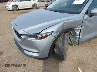 2017 Mazda CX-5 Grand Touring with VIN JM3KFBDL8H0227348, listed as a IAAI auction lot 41572377 with 124,908 mi miles. Bid and sale history available at carsss.com. Image 6.