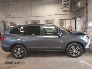 2016 Honda Pilot EX-L with VIN 5FNYF6H51GB097323, listed as a IAAI auction lot 41989978 with 105,006 mi miles. Bid and sale history available at carsss.com. Image 13.