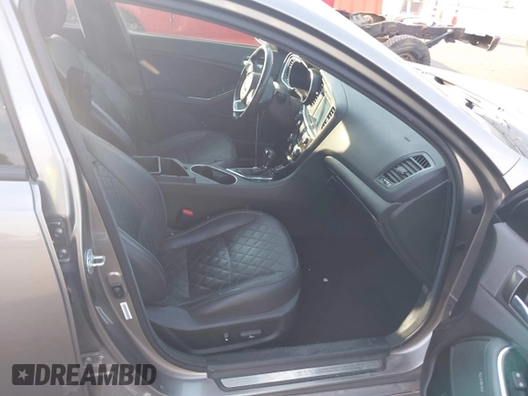 2015 Kia Optima SX Turbo with VIN 5XXGR4A61FG395148, listed as a IAAI auction lot 40313811 with 104,978 mi miles and . Bid and sale history available at DreamBid. Image 5.