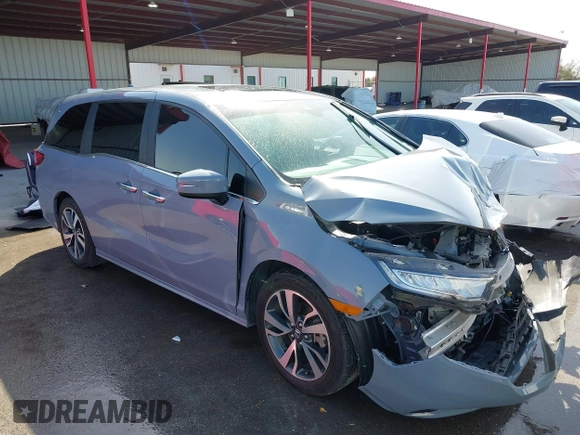 2024 Honda Odyssey Touring with VIN 5FNRL6H82RB027601, listed as a IAAI auction lot 41808680 with 25,911 mi miles and . Bid and sale history available at DreamBid. Image 1.