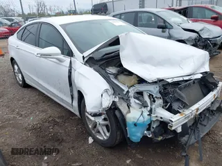 2016 Ford Fusion SE with VIN 1FA6P0H70G5105051, listed as a IAAI auction lot 42002630 with 178,851 mi miles. Bid and sale history available at carsss.com. Image 1.