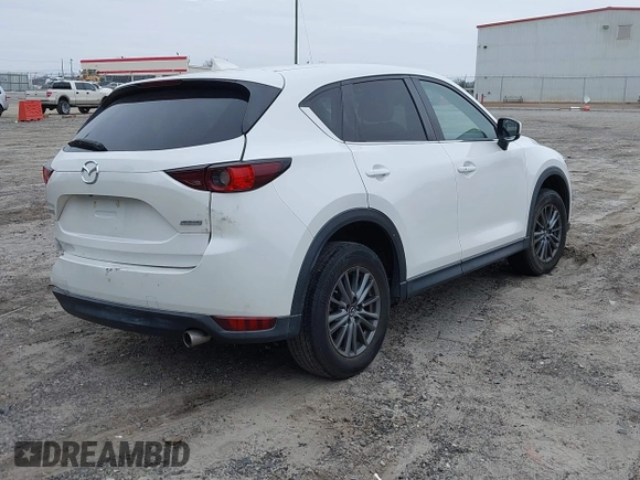 2017 Mazda CX-5 Touring with VIN JM3KFACL8H0205717, listed as a IAAI auction lot 41173725 with 107,604 mi miles. Bid and sale history available at carsss.com. Image 4.