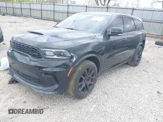2021 Dodge Durango SRT Hellcat with VIN 1C4SDJH91MC682235, listed as a IAAI auction lot 42029380 with 9,921 mi miles and . Bid and sale history available at DreamBid. Image 18.