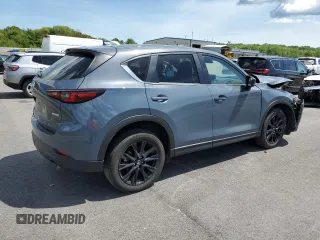 2024 Mazda CX-5 S Carbon Edition z VIN JM3KFBCL9R0514538, wystawiony jako Copart lot #58518615 z przebiegiem 23 037 mil mil oraz Tytuł czysty. Historia ofert i sprzedaży dostępna na DreamBid. Obrazek 3.