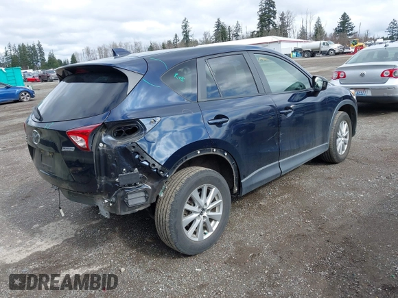 2015 Mazda CX-5 Touring with VIN JM3KE4CY5F0453646, listed as a IAAI auction lot 41740574 with 91,167 mi miles. Bid and sale history available at carsss.com. Image 4.