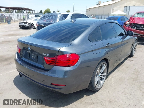 2015 BMW 4 Series 428i with VIN WBA4A5C59FG052596, listed as a IAAI auction lot 42649927 with 68,842 mi miles and . Bid and sale history available at DreamBid. Image 4.