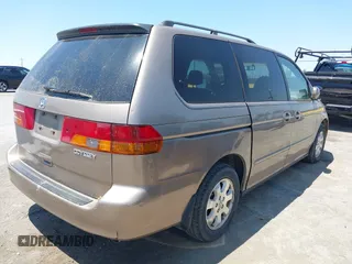 2003 Honda Odyssey EX-L with VIN 5FNRL18993B127164, listed as a IAAI auction lot 42474080 with 152,838 mi miles and . Bid and sale history available at DreamBid. Image 4.