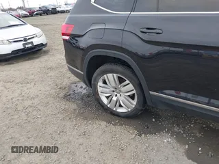 2018 Volkswagen Atlas SEL Premium z VIN 1V2NR2CAXJC554740, wystawiony jako IAAI lot #41773681 z przebiegiem 83 296 mil mil oraz . Historia ofert i sprzedaży dostępna na DreamBid. Obrazek 6.