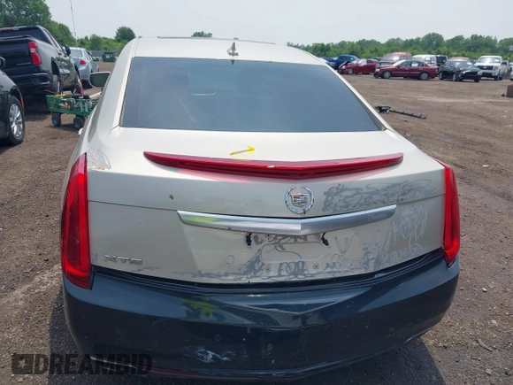 2014 Cadillac XTS Luxury z VIN 2G61M5S38E9291182, wystawiony jako IAAI lot #42495838 z przebiegiem 104 941 mil mil oraz . Historia ofert i sprzedaży dostępna na DreamBid. Obrazek 16.