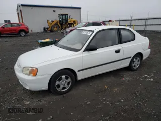 2002 Hyundai Accent z VIN KMHCF35G52U207137, wystawiony jako Copart lot #82818574 z przebiegiem 185 177 mil mil oraz Szkoda całkowita • Salvage title. Historia ofert i sprzedaży dostępna na DreamBid. Obrazek 1.