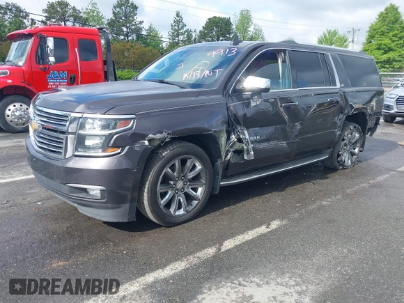 2015 Chevrolet Suburban LTZ with VIN 1GNSKKKC4FR589913, listed as a IAAI auction lot 42017190 with 216,145 mi miles. Bid and sale history available at carsss.com. Image 17.