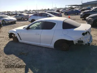 2005 Mazda RX-8 with VIN JM1FE173650147951, listed as a Copart auction lot 76422174 with Not Provided miles and Salvage Title. Bid and sale history available at carsss.com. Image 2.