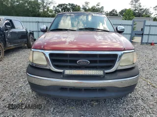 2001 Ford F-150 XLT with VIN 1FTRW07LX1KD65474, listed as a Copart auction lot 61474655 with 361,023 mi miles and Salvage title. Bid and sale history available at DreamBid. Image 5.