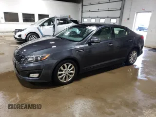 2015 Kia Optima EX z VIN 5XXGN4A79FG496636, wystawiony jako Copart lot #66579835 z przebiegiem 169 014 mil mil oraz Czysty tytuł • Clean title. Historia ofert i sprzedaży dostępna na DreamBid. Obrazek 1.