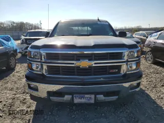 2015 Chevrolet Silverado 1500 LT with VIN 3GCUKREC8FG472406, listed as a Copart auction lot 85276134 with 257,034 mi miles and Salvage Title. Bid and sale history available at DreamBid. Image 5.