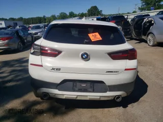 2022 BMW X2 xDrive28i z VIN WBXYJ1C02N5U27145, wystawiony jako Copart lot #56110705 z przebiegiem Nie podano mil oraz Szkody całkowita. Historia ofert i sprzedaży dostępna na DreamBid. Obrazek 6.