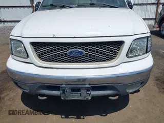 2001 Ford F-150 XL with VIN 1FTRX18L71NA62779, listed as a IAAI auction lot 42492875 with Not provided miles and . Bid and sale history available at DreamBid. Image 6.