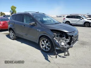 2015 Ford Escape Titanium with VIN 1FMCU9J99FUC13108, listed as a Copart auction lot 60815265 with 70,938 mi miles and Salvage title. Bid and sale history available at DreamBid. Image 4.