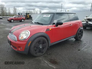 2009 MINI Hardtop with VIN WMWMF33509TU73771, listed as a Copart auction lot 51156025 with 119,622 mi miles and Salvage Title. Bid and sale history available at DreamBid. Image 1.
