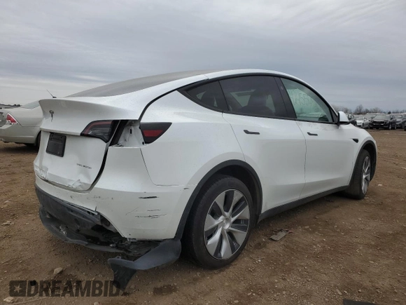 2023 Tesla Model Y Long Range with VIN 7SAYGDEEXPF839677, listed as a Copart auction lot 50845175 with 36,661 mi miles and Salvage Title. Bid and sale history available at DreamBid. Image 3.