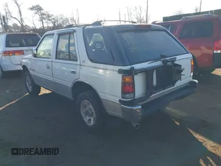 1994 Isuzu Rodeo LS z VIN 4S2CG58V5R4332970, wystawiony jako IAAI lot #41680075 z przebiegiem 182 330 mil mil oraz . Historia ofert i sprzedaży dostępna na DreamBid. Obrazek 3.