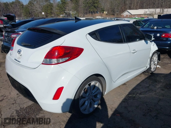 2013 Hyundai Veloster w/Black Int with VIN KMHTC6AD5DU116443, listed as a IAAI auction lot 41635858 with 170,173 mi miles and . Bid and sale history available at DreamBid. Image 4.