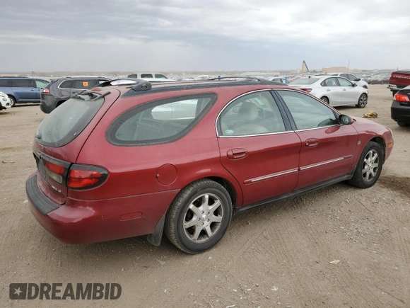 2002 Mercury Sable LS Premium z VIN 1MEFM59S52A640037, wystawiony jako Copart lot #77318134 z przebiegiem 137 836 mil mil oraz Szkody całkowita. Historia ofert i sprzedaży dostępna na DreamBid. Obrazek 3.