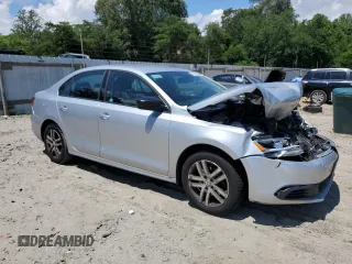 2014 Volkswagen Jetta S with VIN 3VW2K7AJ3EM227817, listed as a Copart auction lot 61415465 with 121,248 mi miles and Salvage title. Bid and sale history available at DreamBid. Image 4.